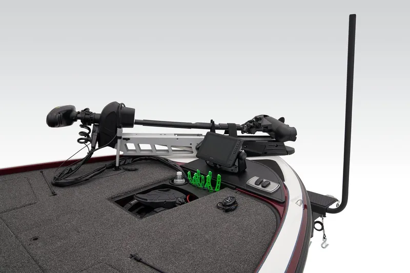 Slide: The Image of 2025 Nitro Z19 boat storage compartment with open lid and cup holders. - 12