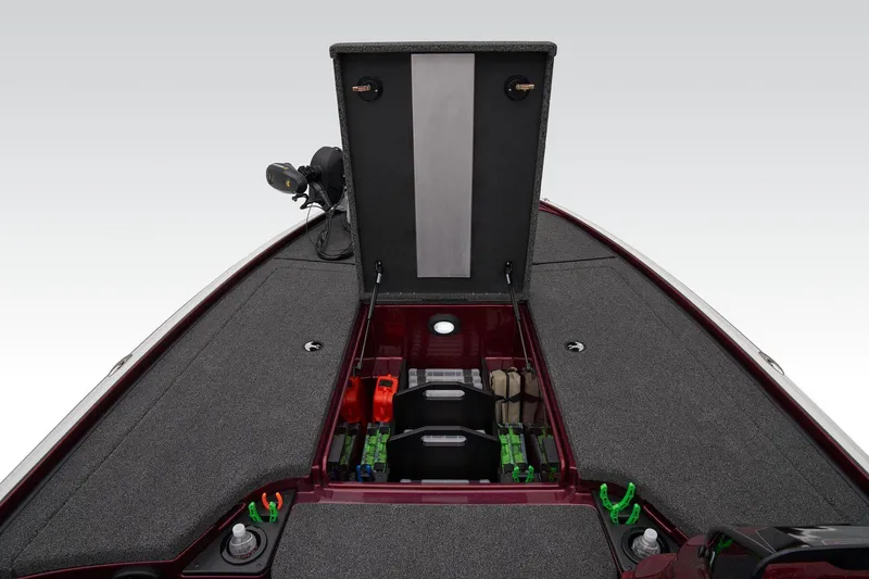 Slide: The Image of 2025 Nitro Z19 boat interior with gray seating and storage compartments. - 18