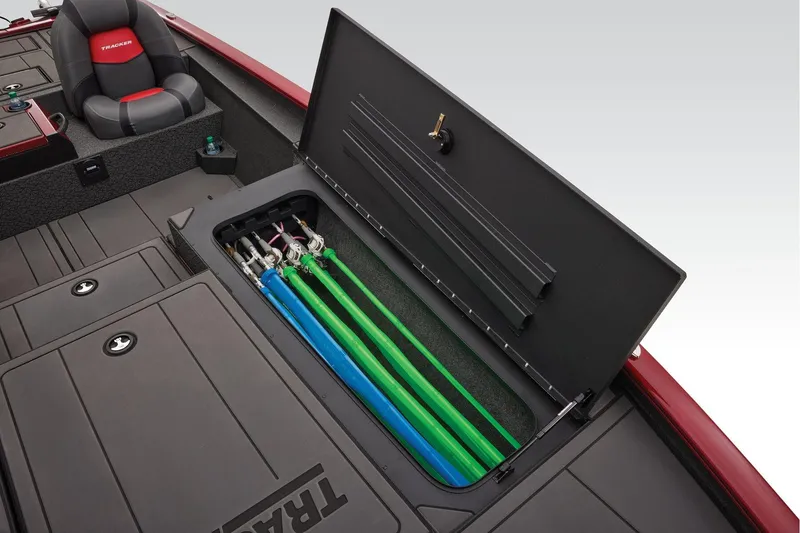 Slide: The Image of 2025 Tracker Savage 215 boat with open storage compartment and fishing rods. - 5
