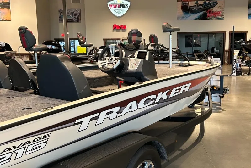 The Image of 2025 Tracker Savage 215 boat on trailer outside service center. - 0