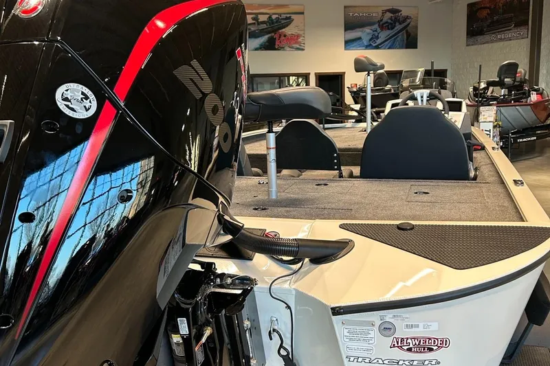Slide: The Image of Mercury Pro XS 200 outboard motor on 2025 Tracker Savage 215 boat. - 2