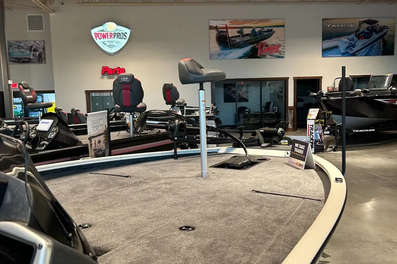 Slide: The Image of 2025 Tracker Savage 215 boat with outboard motor on trailer. - 3