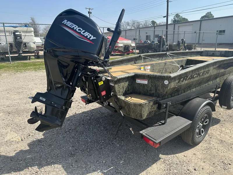 Slide: The Image of 2025 Tracker Grizzly 1650 T Prairie Wings Edition boat with Mercury outboard motor. - 4