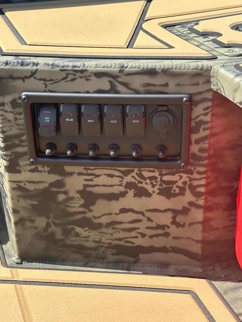 Slide: The Image of Control panel of 2025 Tracker Grizzly 1650 T Prairie Wings Edition boat. - 9