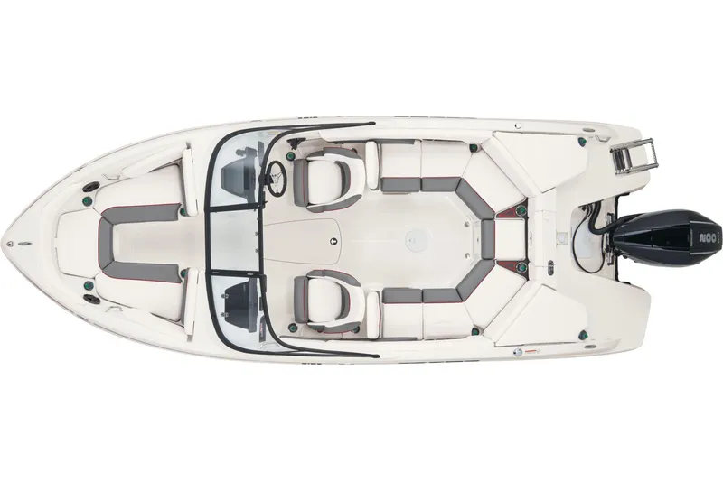 Slide: The Image of 2025 Tahoe 210 S boat on trailer, parked on a sunny road. - 2