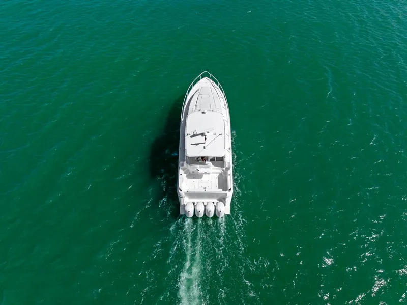 Slide: The Image of Aerial view of 2018 Intrepid 475 Sport Yacht cruising on open water. - 10