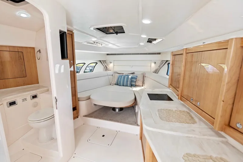 Slide: The Image of Luxurious interior of 2018 Intrepid 475 Sport Yacht with modern amenities and elegant design. - 42