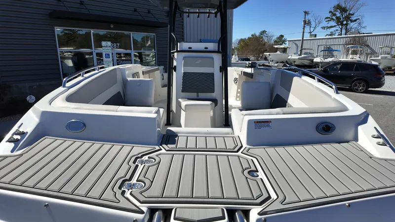 Slide: The Image of 2025 Starcraft SVX 231 OB CC boat interior with spacious seating and modern design. - 5
