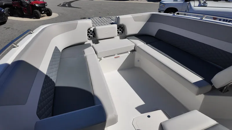 Slide: The Image of 2025 Starcraft SVX 231 OB CC boat interior with spacious seating and modern design. - 6