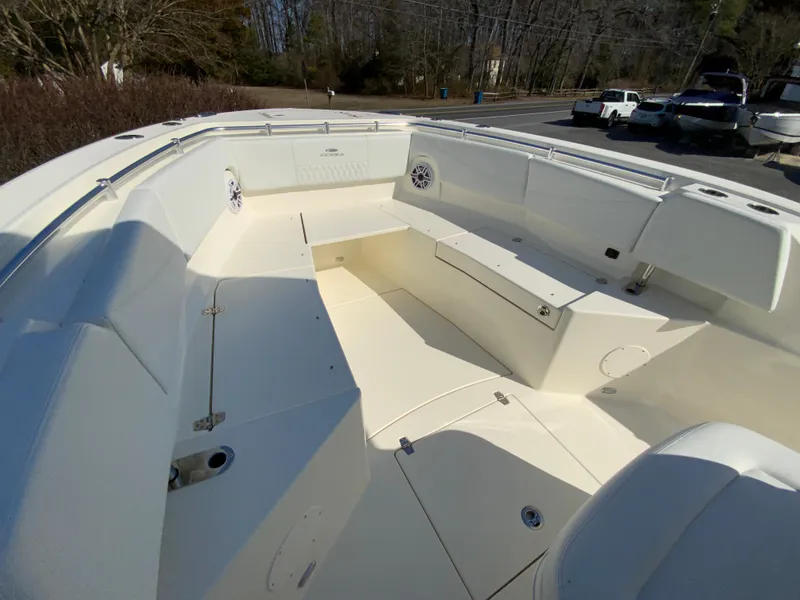 Slide: The Image of 2025 Cobia 320 Center Console boat with spacious seating and sleek design. - 36
