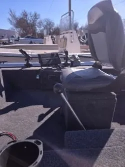 Slide: The Image of 2023 Lowe Skorpion 16 boat interior with seating and control panel. - 10