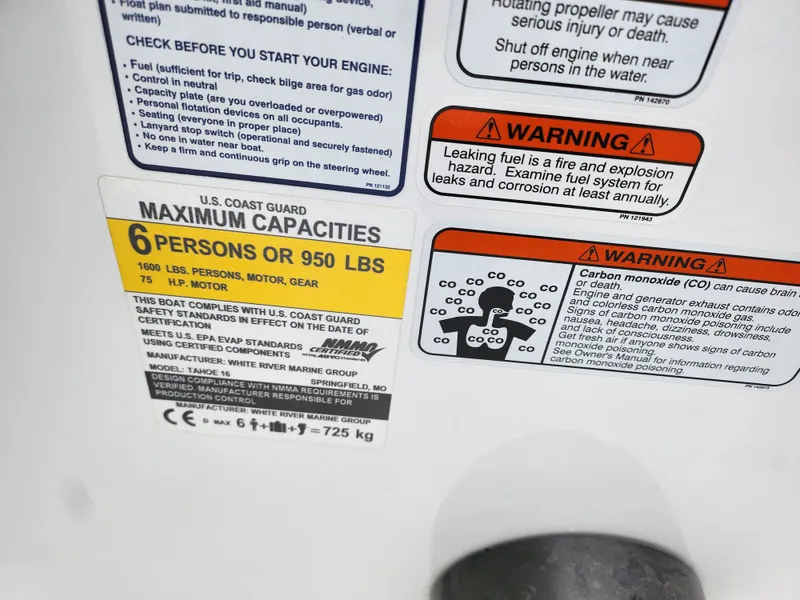 Slide: The Image of 2023 Tahoe T16 capacity label: 6 persons or 950 lbs, safety warnings included. - 13