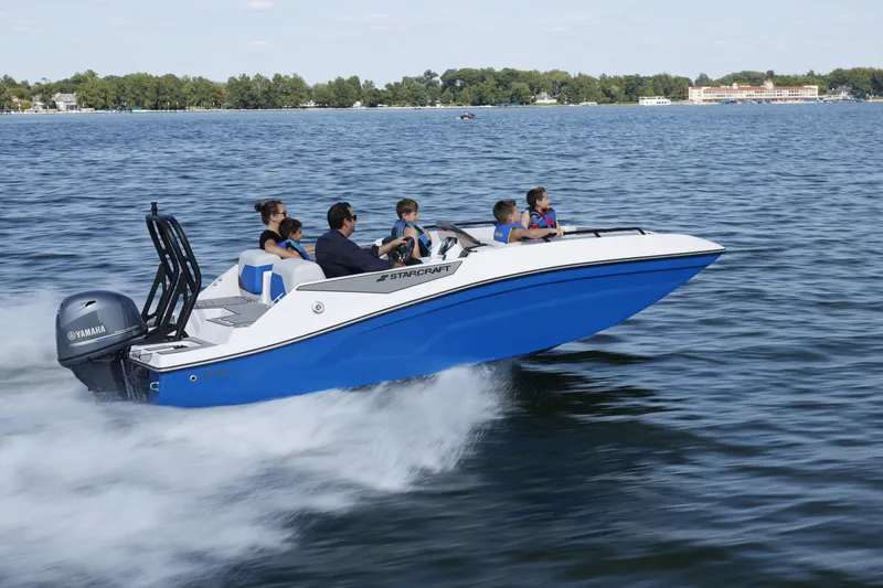 Slide: The Image of 2025 Starcraft SV 16 OB boat cruising on a lake with passengers enjoying the ride. - 23