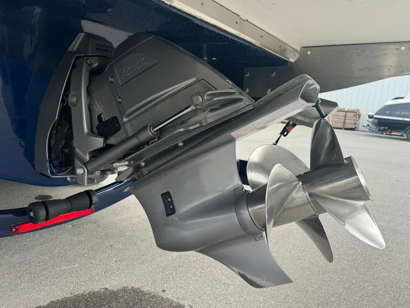 Slide: The Image of Close-up of a 2021 Regal 2800 Bowrider's Volvo Penta outdrive and propeller. - 33