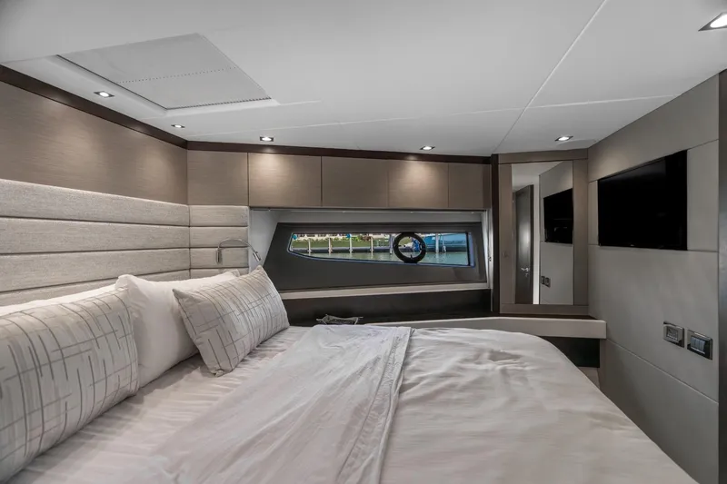 Slide: The Image of Staircase inside 2019 Sunseeker Manhattan 66 yacht, featuring modern design and wooden steps. - 15