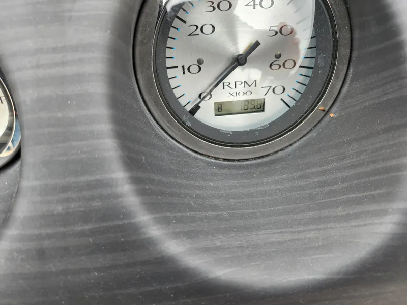 Slide: The Image of Close-up of RPM gauge on 2019 Bennington SX 22 Cruise and Fish boat dashboard. - 24