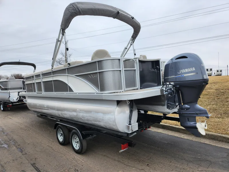 Slide: The Image of 2019 Bennington SX 22 Cruise and Fish pontoon boat on trailer with Yamaha outboard motor. - 3