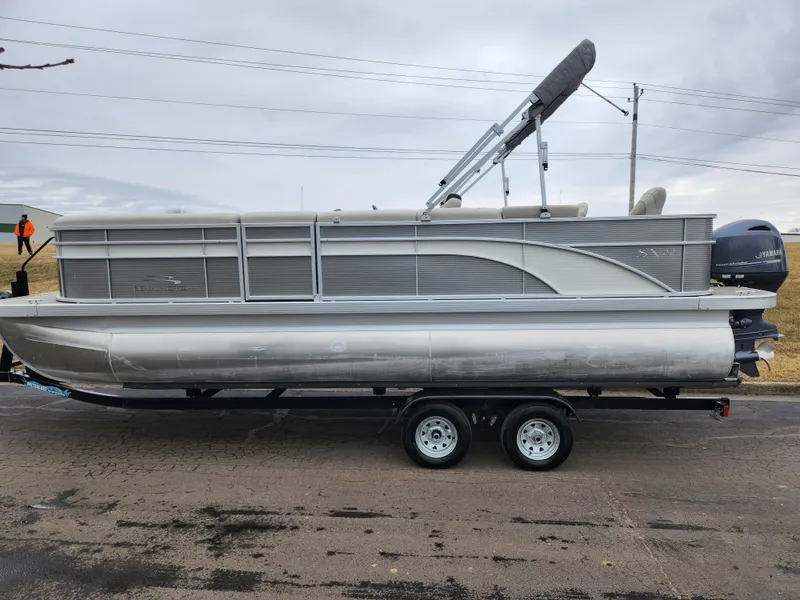 Slide: The Image of 2019 Bennington SX 22 Cruise and Fish pontoon boat on trailer, side view. - 4