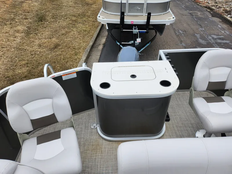 Slide: The Image of 2019 SunCatcher V16 Fish pontoon boat interior with seating and storage. - 14