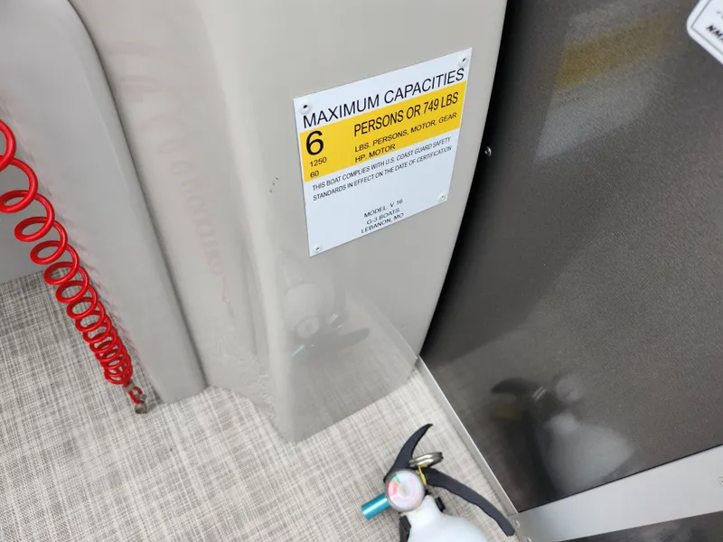 Slide: The Image of 2019 SunCatcher V16 Fish boat capacity label, showing maximum 6 persons or 749 lbs. - 21