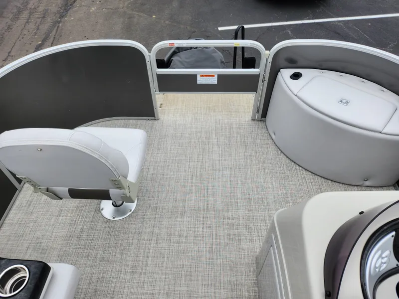 Slide: The Image of 2019 SunCatcher V16 Fish boat interior with seating and storage compartments. - 22