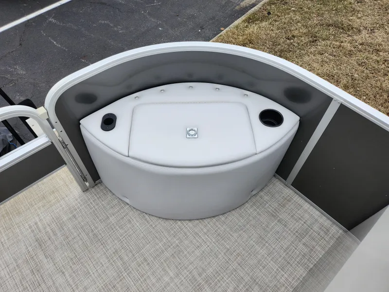Slide: The Image of 2019 SunCatcher V16 Fish boat seating area with cup holders and storage compartment. - 23