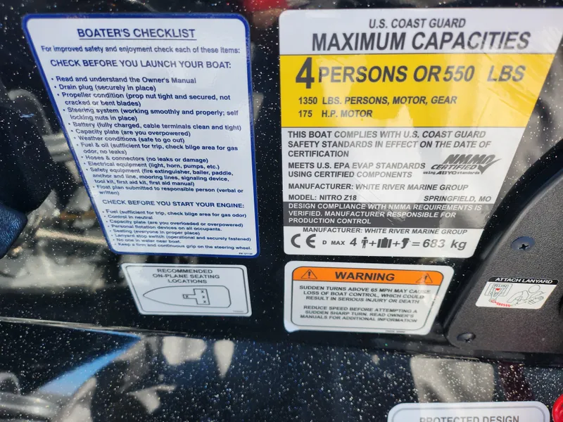 Slide: The Image of Boat capacity and safety labels on a 2021 Nitro Z18 Pro. - 13