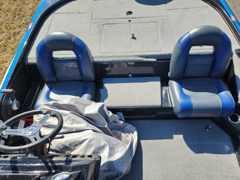 Slide: The Image of 2021 Nitro Z18 Pro boat interior with dual blue seats and steering wheel. - 20