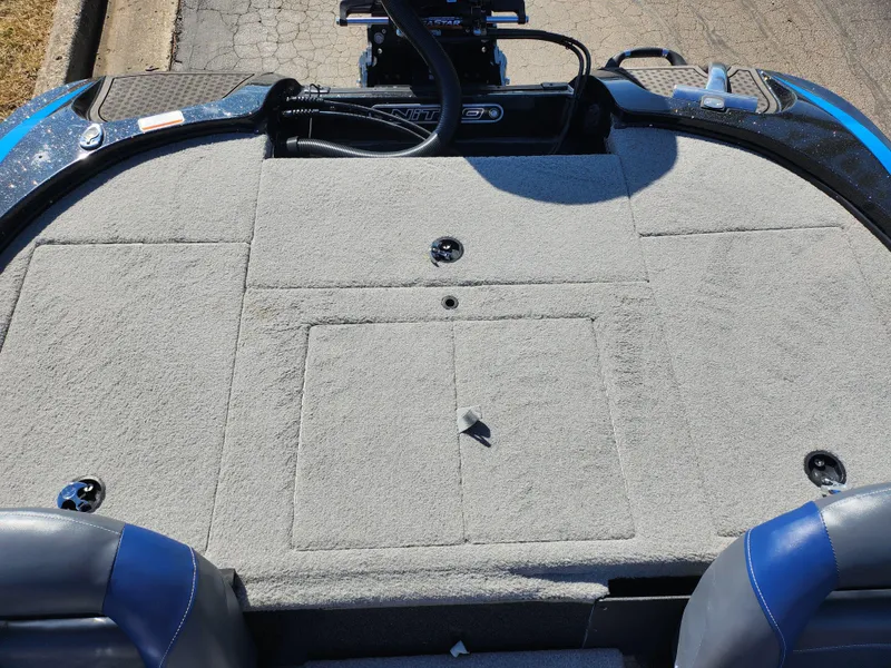 Slide: The Image of 2021 Nitro Z18 Pro boat deck with gray carpet and seating. - 22