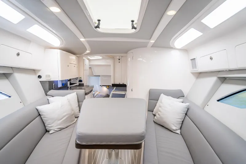Slide: The Image of Luxurious interior of 2020 Intrepid 407 Cuddy boat with modern seating and lighting. - 23