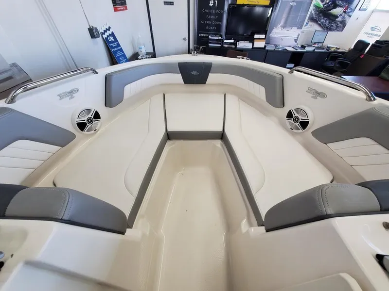Slide: The Image of Interior view of 2019 Chaparral 21 H2O OB Sport boat with gray and white seating. - 9