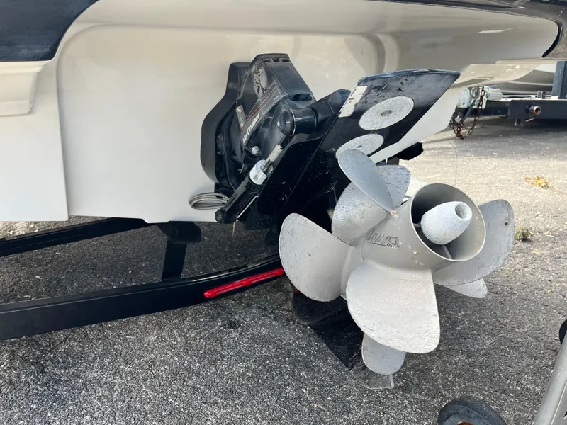 Slide: The Image of 2021 Crownline 220SS boat propeller and stern drive on a trailer. - 4