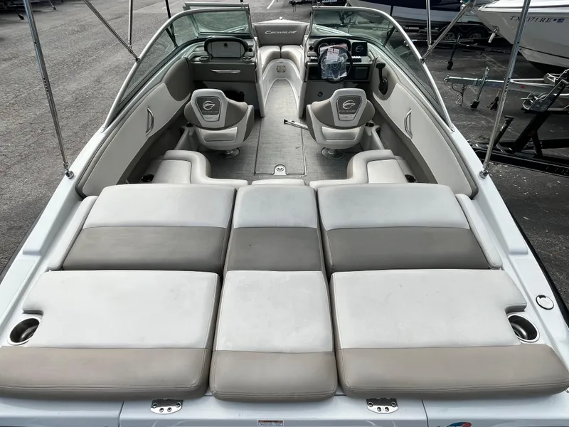 Slide: The Image of 2021 Crownline 220SS boat interior with spacious seating and modern design. - 7