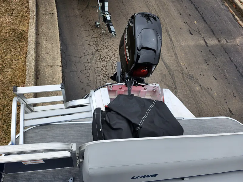 Slide: The Image of 2022 Lowe Ultra 160 Cruise boat with Mercury outboard motor, viewed from above. - 16