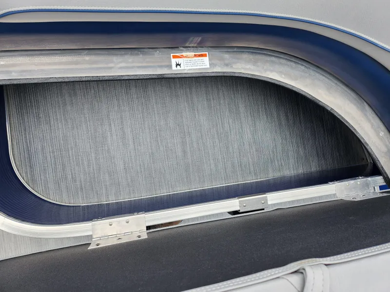 Slide: The Image of Interior detail of a 2022 Lowe Ultra 160 Cruise boat, showcasing upholstery and metal frame. - 22