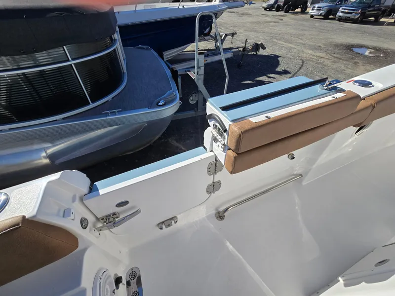 Slide: The Image of 2022 Sea Hunt Ultra 255 SE boat interior with seating and deck details. - 27