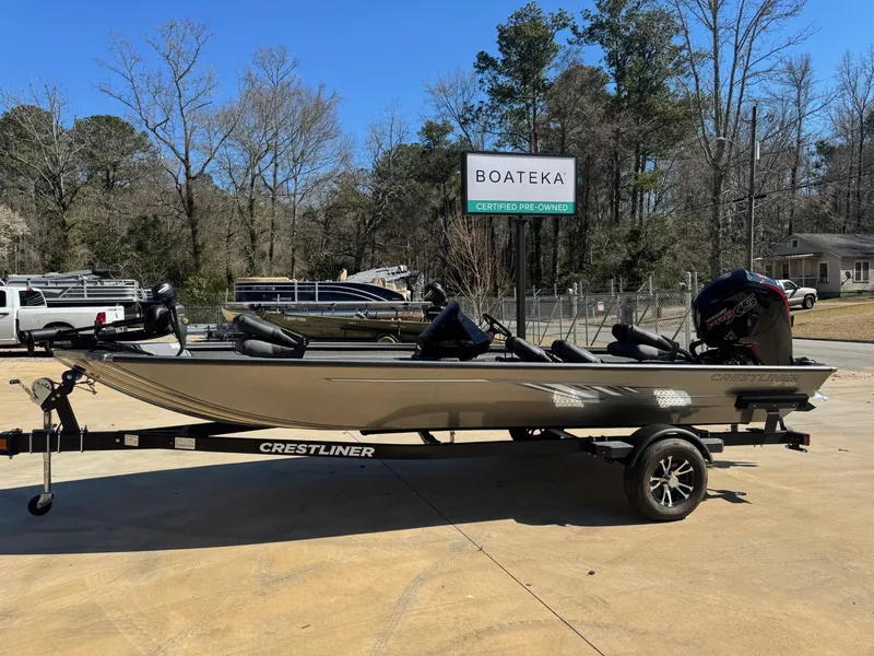 Slide: The Image of 2023 Crestliner XF 189 boat on trailer in outdoor setting. - 1