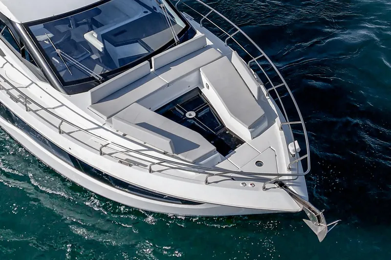Slide: The Image of 2025 Galeon 500 Fly yacht cruising on blue ocean waters. - 19