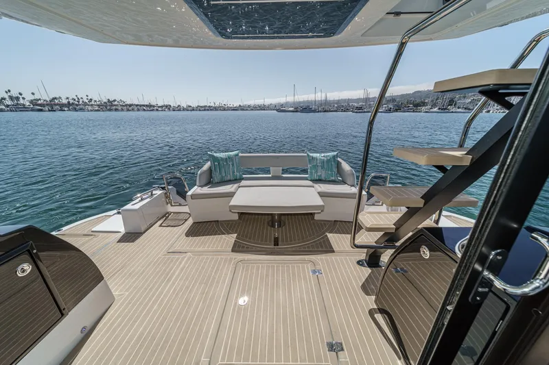 Slide: The Image of Luxurious 2025 Galeon 500 Fly yacht deck with scenic ocean view. - 23