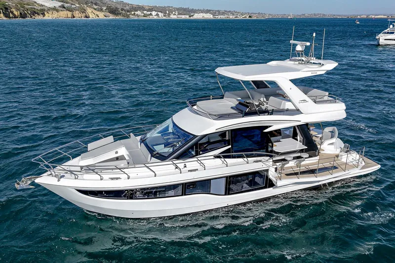Slide: The Image of 2025 Galeon 500 Fly yacht cruising on open water. - 3