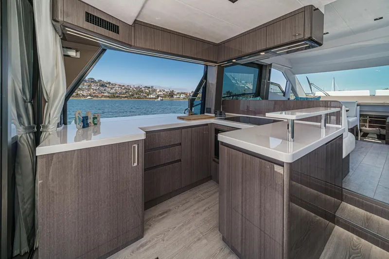 Slide: The Image of Luxurious interior of 2025 Galeon 500 Fly yacht with modern kitchen design. - 34