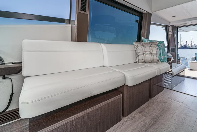 Slide: The Image of Luxurious interior seating on the 2025 Galeon 500 Fly yacht with modern design. - 39