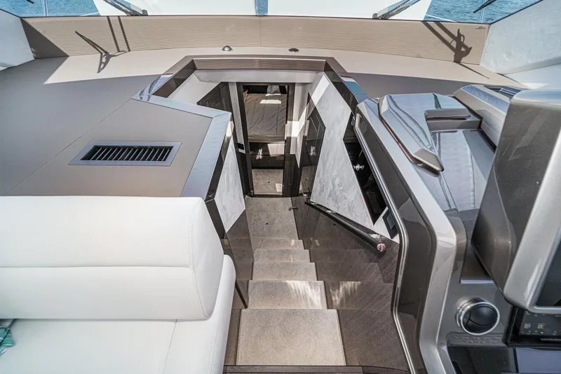 Slide: The Image of Interior view of 2025 Galeon 500 Fly yacht, featuring modern design and luxurious seating. - 42