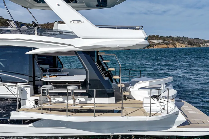 Slide: The Image of 2025 Galeon 500 Fly yacht on water, showcasing sleek design and modern features. - 5
