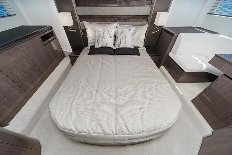 Slide: The Image of Luxurious bedroom interior of 2025 Galeon 500 Fly yacht with elegant bedding and modern design. - 50