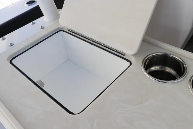 Slide: The Image of Edgewater 325CC 2025 boat sink with circular cover and faucet. - 21