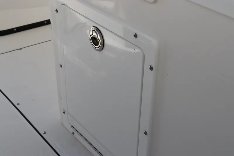 Slide: The Image of Control panel with seven buttons on a 2025 Edgewater 325CC boat. - 30