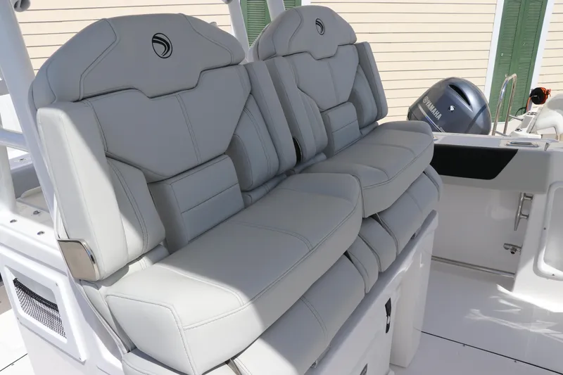 Slide: The Image of 2025 Edgewater 325CC boat cooler with black latches and ICON label. - 34