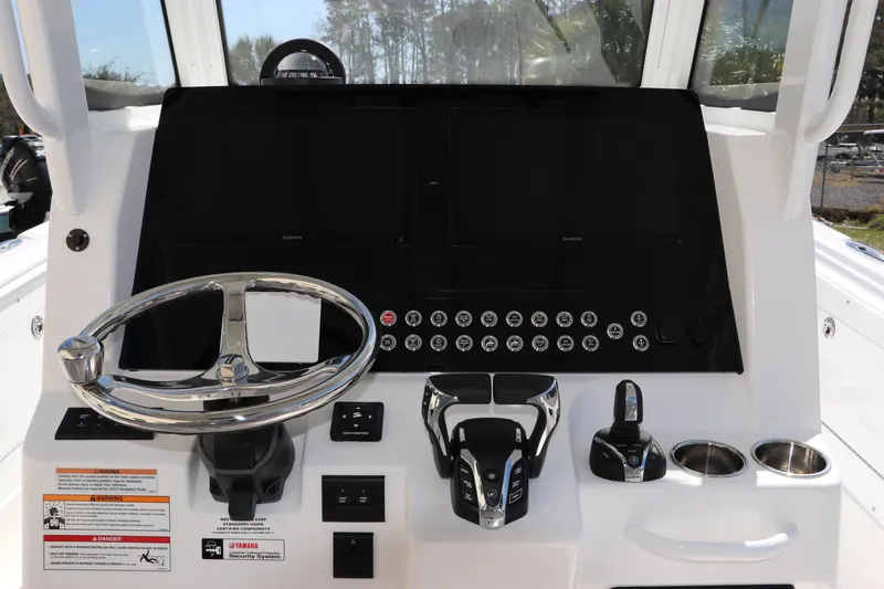 Slide: The Image of 2025 Edgewater 325CC boat seats, featuring luxurious gray upholstery and ergonomic design. - 36