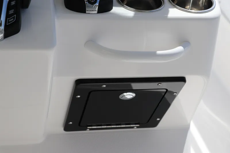Slide: The Image of Control panel of 2025 Edgewater 325CC boat with advanced throttle and joystick. - 39
